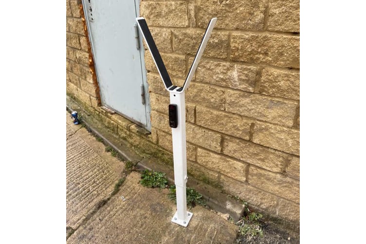 Adjustable end rest and photo cell image