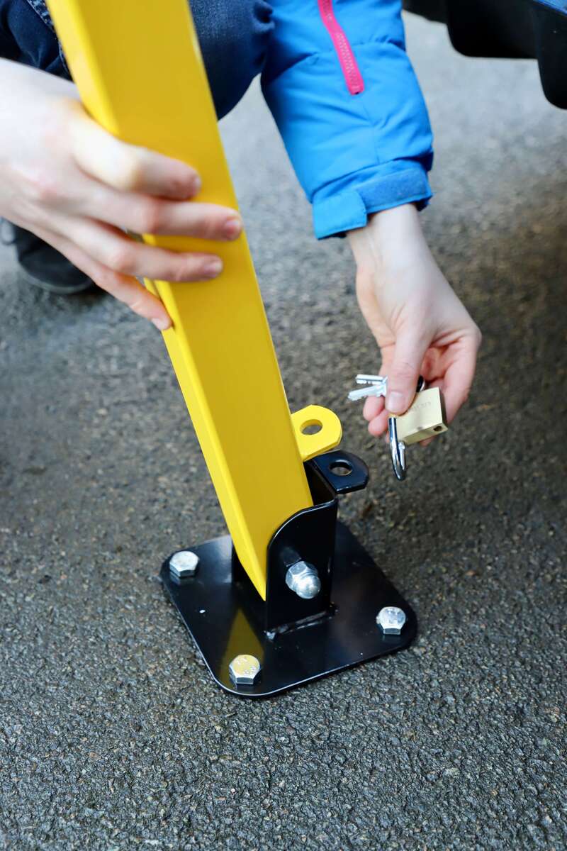 Lockable & Secure: Deter unwanted parking with a pre-installed padlock (included!). image