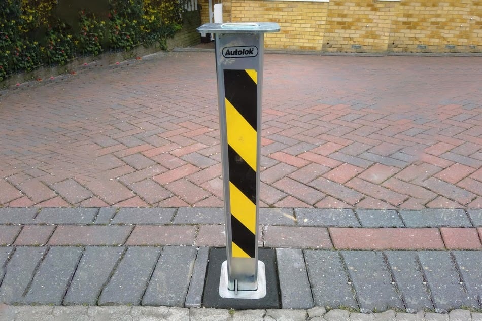 Telescopic Hi Vis Chevron Banded Bollard/Post in-situ on driveway image