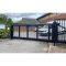 Electric sliding gate at entrance