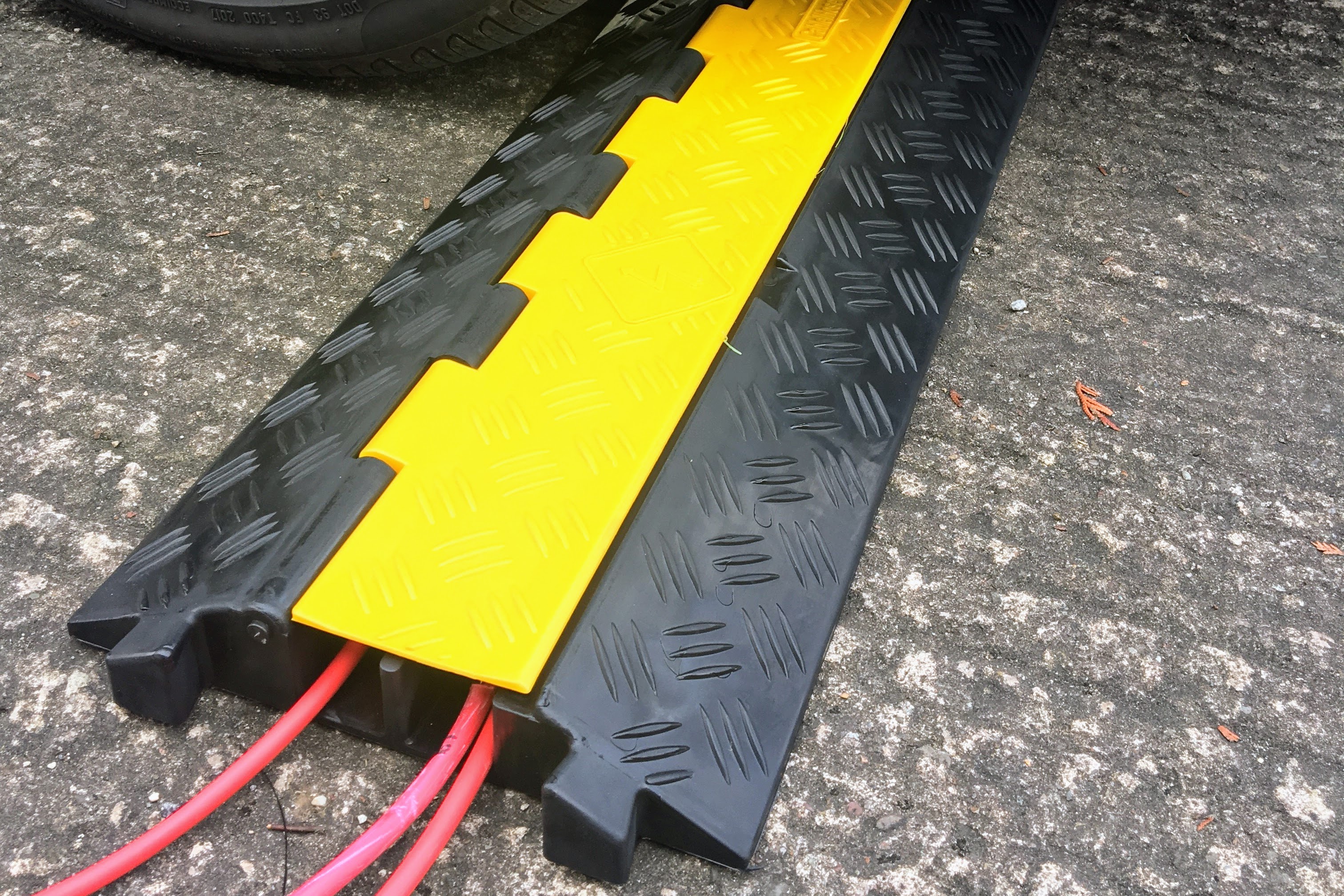 2-Channel Drive Over Ramp: Heavy Duty (8 Ton) - 5 MPH Safe Protects Cables Up To 25mm Durable Rubber & High Visibility. Great Volume Discounts.