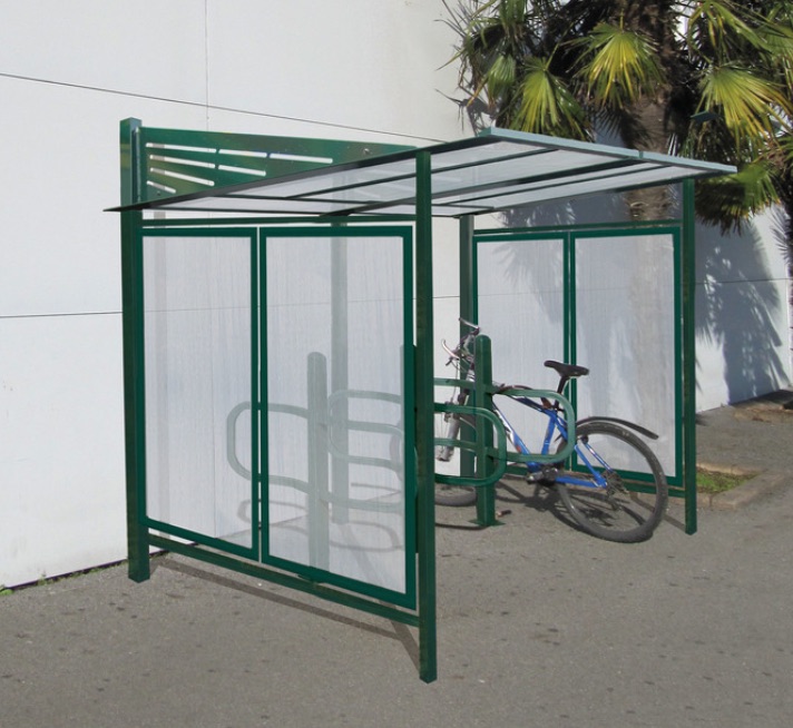 Bicycle Shelter - Modern & innovative cantilever design. Plasma roof supports. Available with or without side and back cladding. To concrete In.