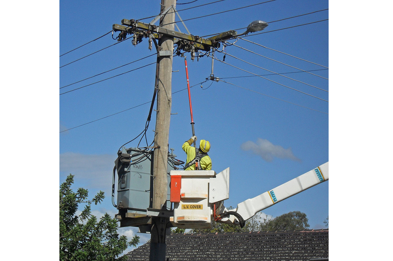 Pole in fibre glass, telescopic. Hot stick is best for protection against electric shock when working with high-voltage power lines.