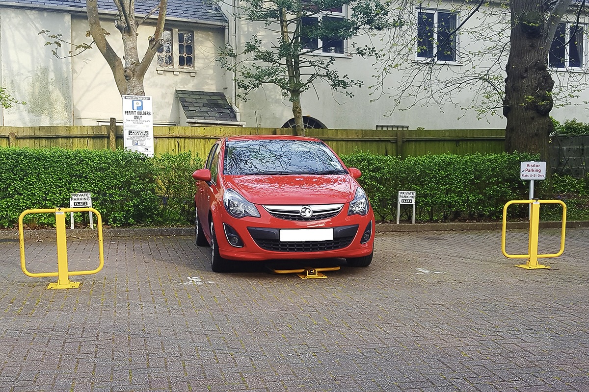 Parking Post Heavy Duty. Winged unique gate design. Surface Mounted. Secures your Parking Space.