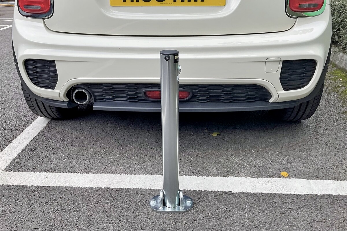 Metal Folding Parking Post with Integral Top Lock 
Zinc or Yellow Finish | Bolt Down or Concrete In